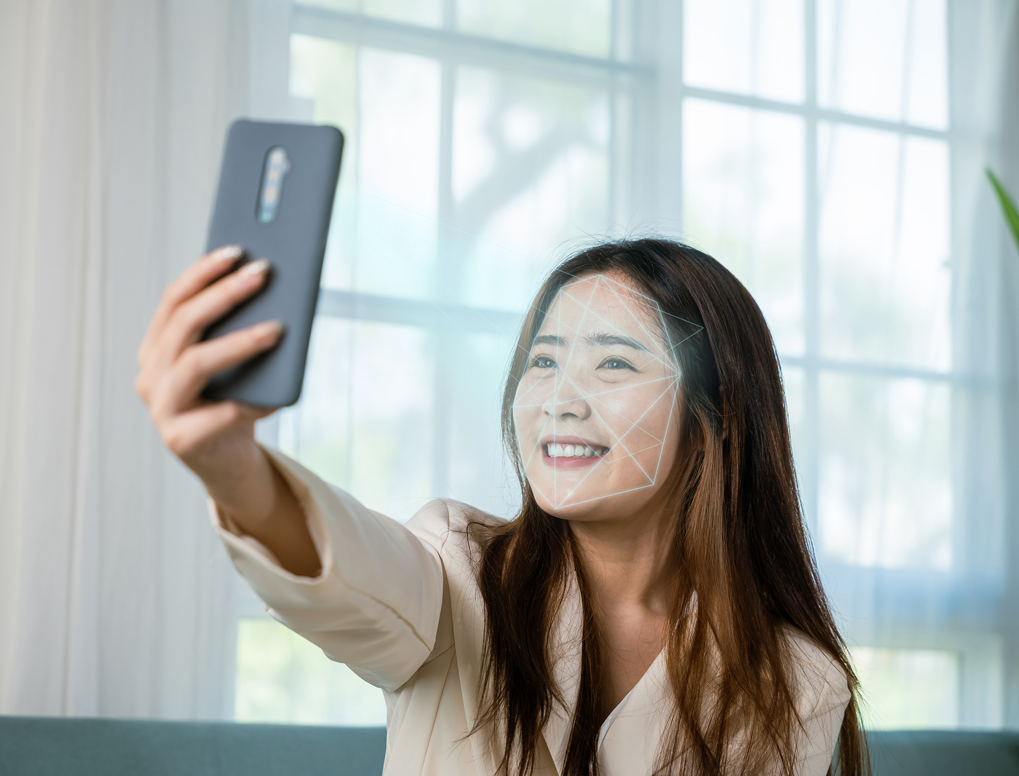 Face unlock systems on smartphones tricked with printed face picture