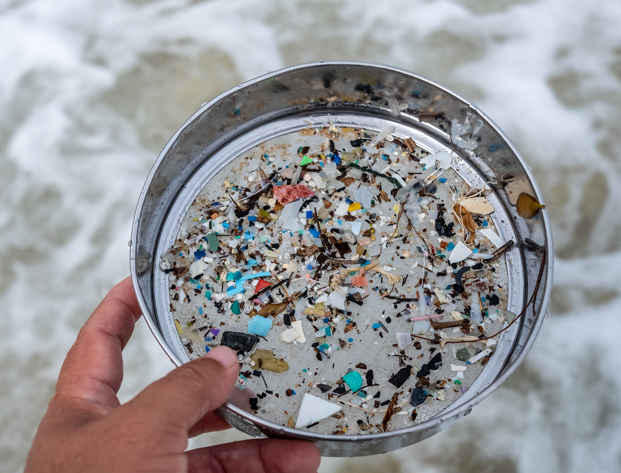 Simple wood dust filter removes 99 per cent of microplastics from water solution