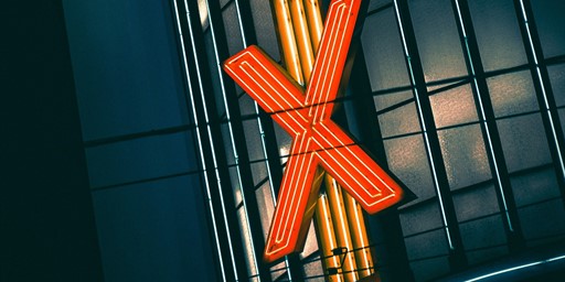 neon X letter in sign