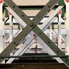 girders on a bridge in an x shape
