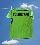  A t-shirt on a laundry line with the slogan 'volunteer'