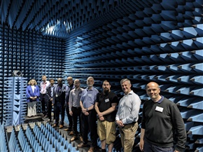 Several people in a sound proof chamber