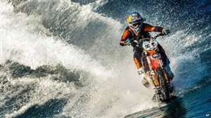 55341c4f4a699b74af4ede6dc2b3b7b2-huge-surfing-on-a-motorcycle.jpg