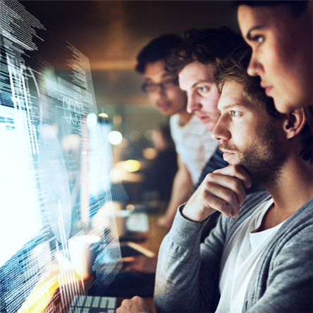 People looking at a computer screen
