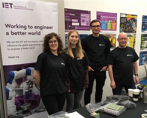 Four IET volunteers on the stand at the Cambridge Festival