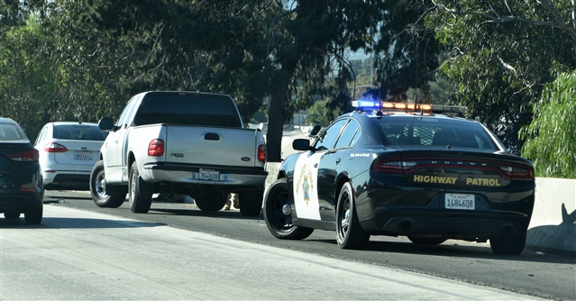 Police car stopping another vehicle