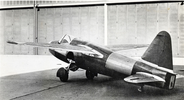 Old photograph of a jet standing on tarmac